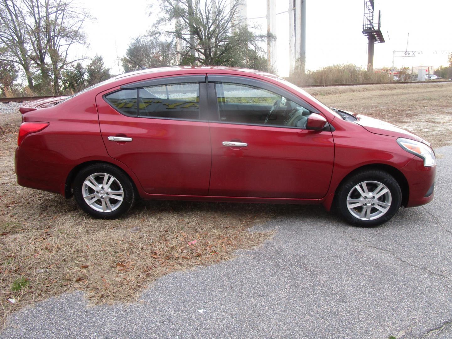 2016 Red Nissan Versa 1.6 S 5M (3N1CN7AP7GL) with an 1.6L L4 DOHC 16V engine, 5M transmission, located at 2553 Airline Blvd, Portsmouth, VA, 23701, (757) 488-8331, 36.813889, -76.357597 - Photo#4